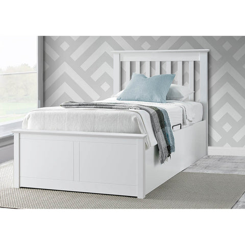 Francis white single wooden ottoman bed styled in a modern bedroom setting