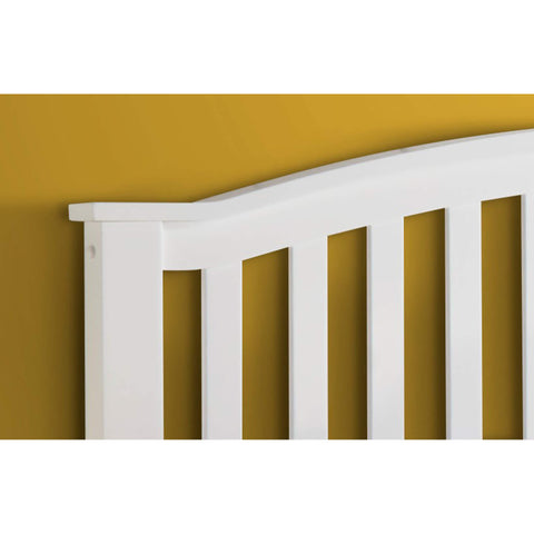Close-up of the curved slatted headboard on the Grayson white wooden storage bed frame
