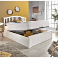 Grayson white wooden ottoman bed with gas-lift base raised showing deep under-bed storage compartments