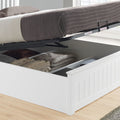 Close-up view of the 27cm deep under-bed storage compartments inside the Grayson white wooden ottoman bed
