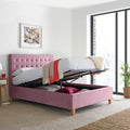 Kingham pink velvet gas-lift ottoman bed lifted open displaying deep under-bed storage space