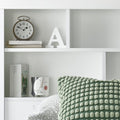 Close up of integrated bookcase headboard shelving on white Oscar wooden gas lift single bed