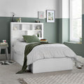 Oscar white wooden gas lift single bed with bookcase headboard in a modern bedroom setting