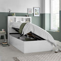 White Oscar single wooden gas lift bed open from side showing spacious under-bed storage compartment