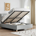 Rhodes grey velvet ottoman bed shown open with spacious underbed storage in a bedroom setting