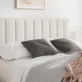 Neatly made Rhodes warmstone velvet ottoman bed with contemporary headboard in a bedroom setting