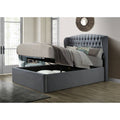 Warwick grey wingback velvet ottoman bed base raised halfway demonstrating smooth hydraulic gas-lift action