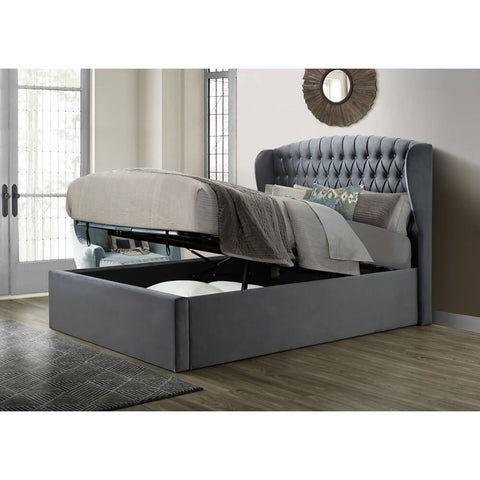 Warwick grey wingback velvet ottoman bed base raised halfway demonstrating smooth hydraulic gas-lift action