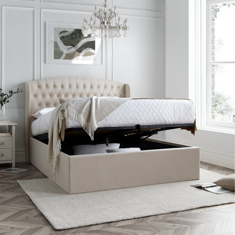 Deep under-bed storage compartment inside Warwick velvet ottoman bed showing solid fully boarded base